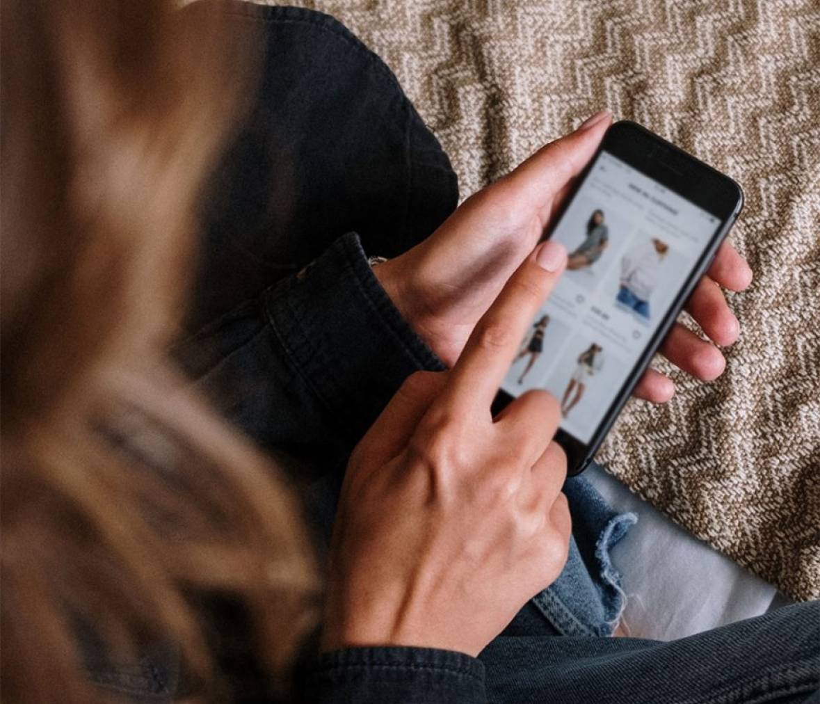 woman using app on mobile phone